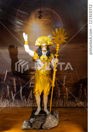 Ancient golden statue of Muisca Indigenous people deity stands tall in the underground Salt Cathedral of Zipaquira, Colombia Ancient golden statue of Muisca Indigenous people deity stands tall in the underground Salt Cathedral of Zipaquira, Colombia 121928352