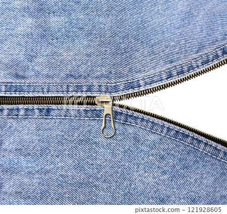 Denim zipper opened. Unzipped zipper or fastener. Open zip and denim fabric. Isolated on white background Denim zipper opened. Unzipped zipper or fastener. Open zip and denim fabric. Isolated on white background 121928605