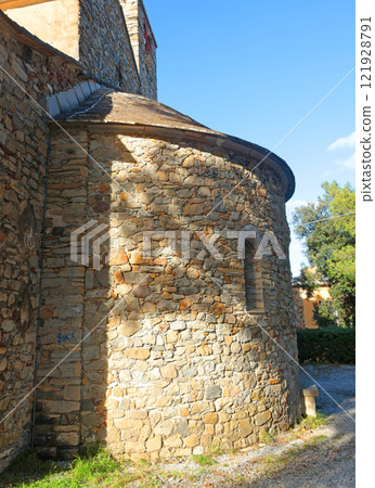 Stone medieval tower on mountain on sunny day. Liguria and traditional historic old building. Sestri Levante, town near sea. 121928791