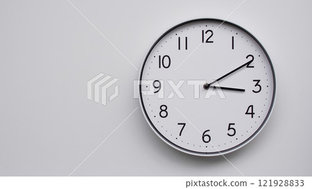 Minimalist Analog Wall Clock with White Face and Simple Black Hands Showing 15.10/03.10 - Ideal for Time Management and Modern Decor Concepts Minimalist Analog Wall Clock with White Face and Simple Black Hands Showing 15.10/03.10 - Ideal for Time Management and Modern Decor Concepts 121928833