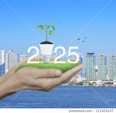 Happy new year 2025 green ecology and saving energy concept Happy new year 2025 green ecology and saving energy concept 121929247
