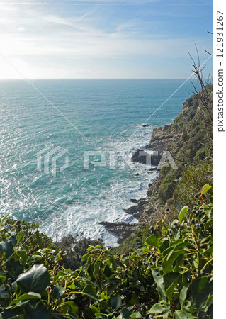 Sea and rock on sunny day. Waves and nature of Mediterranean. Background for design. Sea and rock on sunny day. Waves and nature of Mediterranean. Background for design. 121931267