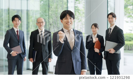 A businessman who plays guts with a smile A businessman who plays guts with a smile 121931298