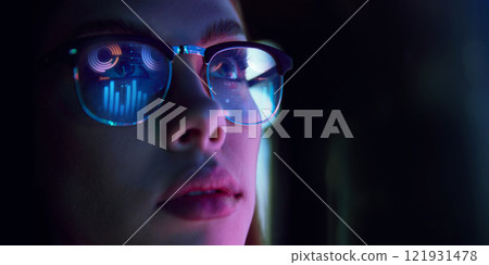 Close-up of businesswoman in glasses reflecting digital graphs, symbolizing data analysis, e-commerce analytics, strategy Close-up of businesswoman in glasses reflecting digital graphs, symbolizing data analysis, e-commerce analytics, strategy 121931478