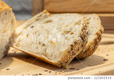 Homemade bread, sourdough wheat loaf with seeds 121933514