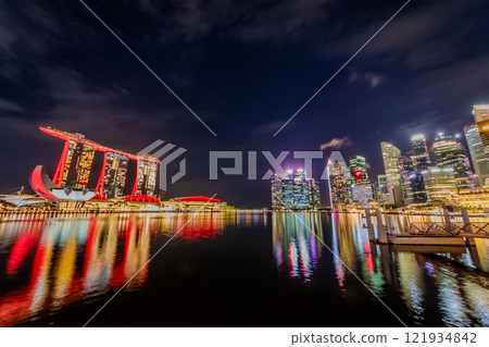 Night view of skyscrapers in downtown Singapore and Marina Bay Sands as seen from Merlion Park Night view of skyscrapers in downtown Singapore and Marina Bay Sands as seen from Merlion Park 121934842