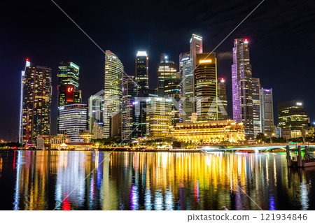 Night view of skyscrapers in downtown Singapore as seen from Merlion Park 121934846