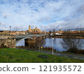 Salamanca. View of Salamanca and the Enrique Estevan bridge from the dock viewing point over the Tormes River. Traditional stone buildings. Salamanca Cathedral. SALAMANCA, SPAIN. 13 JANUARY 2025. 121935572