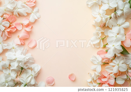 Soft pastel floral arrangement with delicate pink and white flowers creating a serene backdrop for elegant designs 121935825