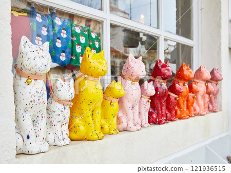 Ceramics for sale on the street market in Nazare. Authentic traditional portuguese souvenirs 121936515