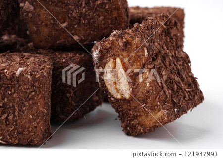 Chocolate oat squares arranged in a stack for a healthy snack option Chocolate oat squares arranged in a stack for a healthy snack option 121937991