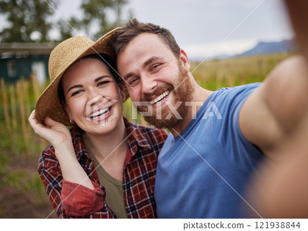 Smile, selfie and nature of happy couple in the countryside smiling, bonding and taking a photo together. Smiling man and woman embracing life, love and relationship in a natural outdoor background. Smile, selfie and nature of happy couple in the countryside smiling, bonding and taking a photo together. Smiling man and woman embracing life, love and relationship in a natural outdoor background. 121938844