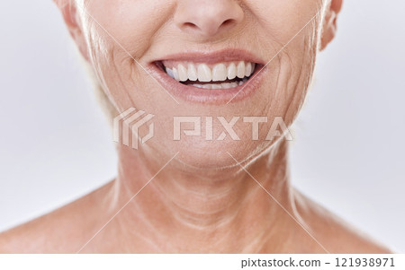 Senior woman with perfect white teeth, dental or Invisalign results and happy mouth closeup in studio. Mature model with a smile for good dentistry health insurance or excellent oral hygiene service Senior woman with perfect white teeth, dental or Invisalign results and happy mouth closeup in studio. Mature model with a smile for good dentistry health insurance or excellent oral hygiene service 121938971