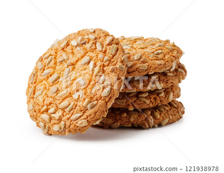 Oatmeal cookies stacked together showing golden color and texture in a simple presentation Oatmeal cookies stacked together showing golden color and texture in a simple presentation 121938978