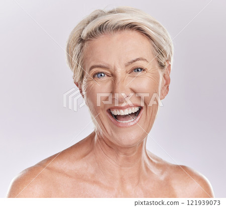 Skincare, wellness and face of senior woman with big smile in beauty, cosmetics or makeup portrait isolated on a studio background. Happy old lady or model with flawless anti aging skin care 121939073