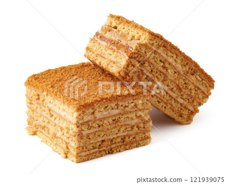 Crunchy, layered dessert showcasing sweet caramel flavors with a rich texture often enjoyed at celebrations Crunchy, layered dessert showcasing sweet caramel flavors with a rich texture often enjoyed at celebrations 121939075