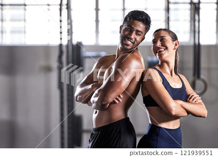 Team, gym and fitness couple doing exercise workout and living a healthy, wellness and athletic lifestyle together. Happy, energy and strong friends using teamwork for fun motivation in training Team, gym and fitness couple doing exercise workout and living a healthy, wellness and athletic lifestyle together. Happy, energy and strong friends using teamwork for fun motivation in training 121939551