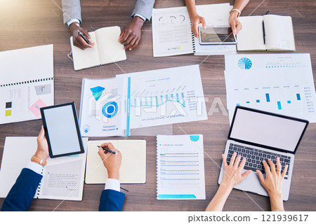 Marketing strategy, project management and data analysis on laptop, tablet and technology in office meeting. Diverse group of planning business people from above analyzing data, kpi charts and profit Marketing strategy, project management and data analysis on laptop, tablet and technology in office meeting. Diverse group of planning business people from above analyzing data, kpi charts and profit 121939617