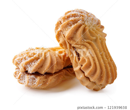 Deliciously shaped cookies stacked together with creamy filling and powdered sugar 121939638