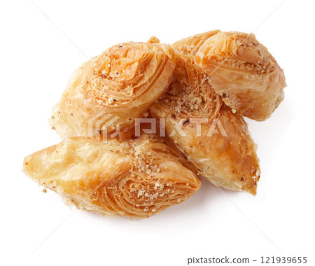 Delicious traditional pastry made with flaky layers and nuts enjoyed at festive gatherings Delicious traditional pastry made with flaky layers and nuts enjoyed at festive gatherings 121939655