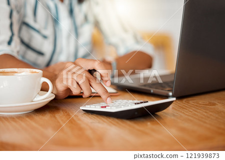 Calculation, budget and finances of hands working with calculator and laptop at a cafe. Finance, costs and income of an accountant calculating or planning financial profits and expenses. 121939873