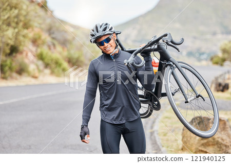 Cycling, bike trail and fitness man carrying his bicycle after riding along a countryside road. Happy male cyclist and athlete wearing a helmet, glasses and gear while training for a sports race Cycling, bike trail and fitness man carrying his bicycle after riding along a countryside road. Happy male cyclist and athlete wearing a helmet, glasses and gear while training for a sports race 121940125