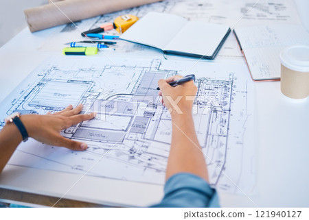 Architect sketching, planning or drawing an architectural design plan or blueprint diagram with draw tools, equipment and stationery. POV hands of man busy working on new designing project structure 121940127