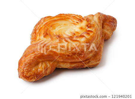 Delicious pastry with flaky layers and a golden brown crust served at a bakery during morning hours 121940201
