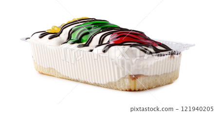 Delicious frozen dessert topped with colorful icing and drizzled chocolate in a clear container 121940205