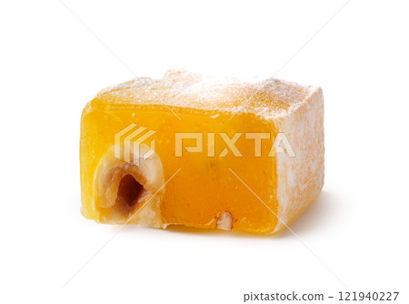 Unique square confection with almond filling and powdered sugar on a white background Unique square confection with almond filling and powdered sugar on a white background 121940227