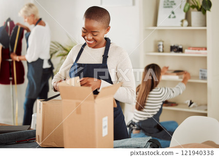 Clothing expert happy with the product, service and packaging. Fashion studio or factory for creative and skilled people. Dressmaker, designer and team get delivery of boxes with export materials 121940338