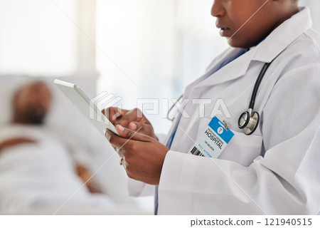 Health, insurance and medicine with a doctor typing on a digital tablet, writing online prescription. Healthcare professional using app on the internet while doing telemedicine in a hospital 121940515