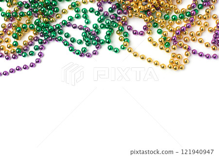 Mardi gras beads on white background 121940947