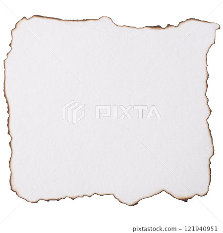 A piece of white paper with burnt edges on a white background 121940951