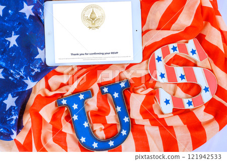 8 January 2025 Washington DC US Tablet shows RSVP confirmation surrounded by American flag and decorative letters for Official Swearing In Ceremony of President Donald J. Trump, Vice President JD 8 January 2025 Washington DC US Tablet shows RSVP confirmation surrounded by American flag and decorative letters for Official Swearing In Ceremony of President Donald J. Trump, Vice President JD 121942533