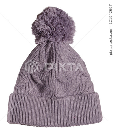 Knitted woolen pink hat with pompom on isolated background 121942697