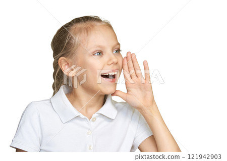 Caucasian young girl shouting cheerfully in white polo, expressive joy Caucasian young girl shouting cheerfully in white polo, expressive joy 121942903