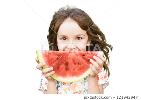 Young caucasian girl enjoying a summer snack with a large watermelon slice Young caucasian girl enjoying a summer snack with a large watermelon slice 121942947