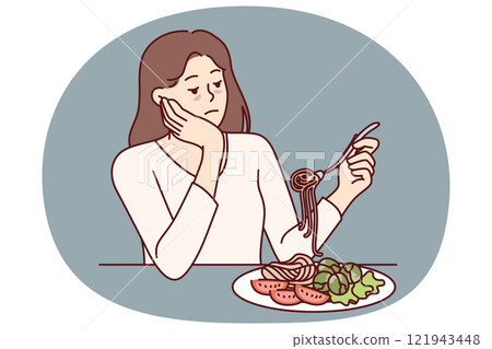 Woman suffering from anorexia is sad due to lack appetite and sits at table with spaghetti in plate 121943448