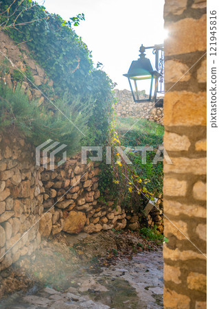 Narrow street in Ulcinj Old Town in Montenegro, the southernmost city at Montenegrin coast, Europe Narrow street in Ulcinj Old Town in Montenegro, the southernmost city at Montenegrin coast, Europe 121945816