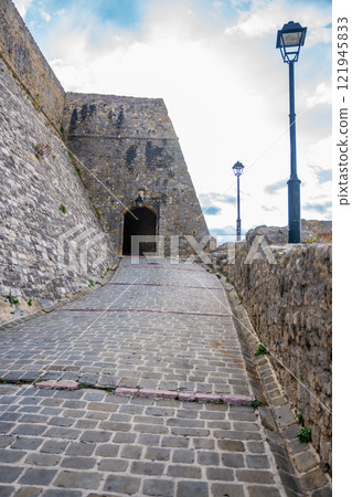 Old gate to Ulcinj Old Town in Montenegro, the southernmost city at Montenegrin coast, Europe Old gate to Ulcinj Old Town in Montenegro, the southernmost city at Montenegrin coast, Europe 121945833