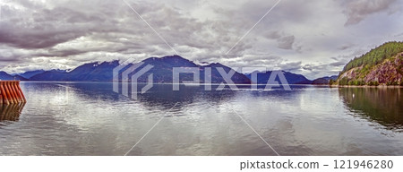 Scenic view over Howe Sound near Vancouver with mountains and water under cloudy sky 121946280