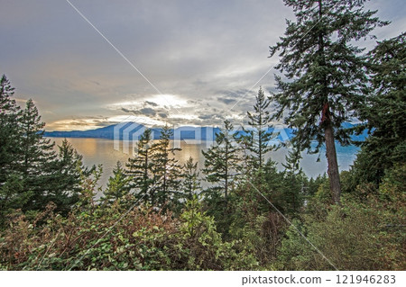 Scenic view over Howe Sound near Vancouver with mountains and water under cloudy sky Scenic view over Howe Sound near Vancouver with mountains and water under cloudy sky 121946283