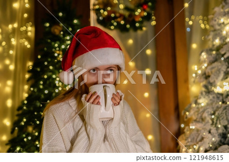 Christmas Girl Hot Chocolate Festive Decorated Room 121948615