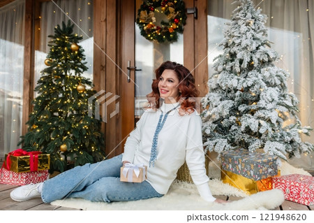 Woman Christmas Decor Gifts Smiling Cozy Cabin Festive Season 121948620