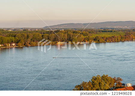 River rooftops trees 121949028