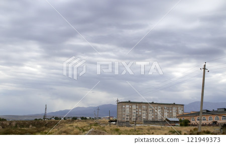 Overcast sky with dark clouds. Dark sky before a thunder-storm. The gray cloud background before rain. 121949373