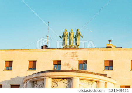 Elegant corner building with classical architecture against a clear blue sky in Belgrade, Serbia. Perfect for urban design, travel, and historical content. High quality photo Elegant corner building with classical architecture against a clear blue sky in Belgrade, Serbia. Perfect for urban design, travel, and historical content. High quality photo 121949451