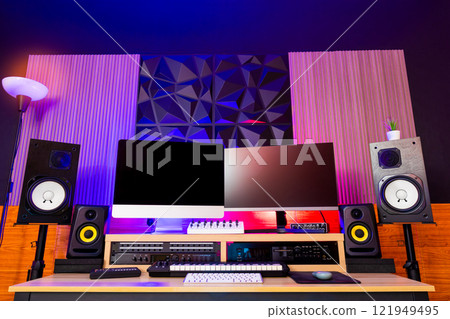 music production studio interior showing modern wall diffusers material installation. desktop computer, studio monitor, audio equipment midi keyboard on desk music production studio interior showing modern wall diffusers material installation. desktop computer, studio monitor, audio equipment midi keyboard on desk 121949495