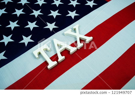 TAX alphabet letters with USA flag background TAX alphabet letters with USA flag background 121949707